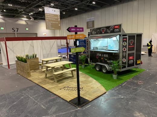 Serving Food on a custom exhibition stand | Motive Exhibitions