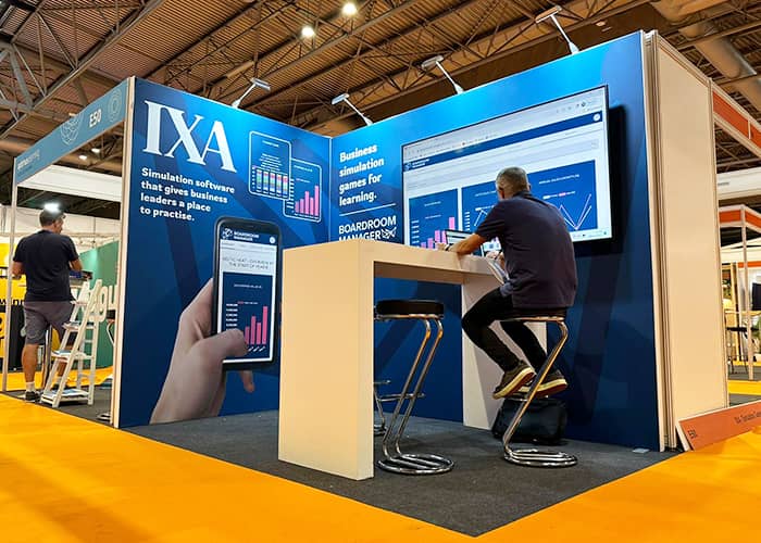 Shell Scheme Exhibition Stand | World of Learning | IXA Boardroom Manager | Motive Exhibitions