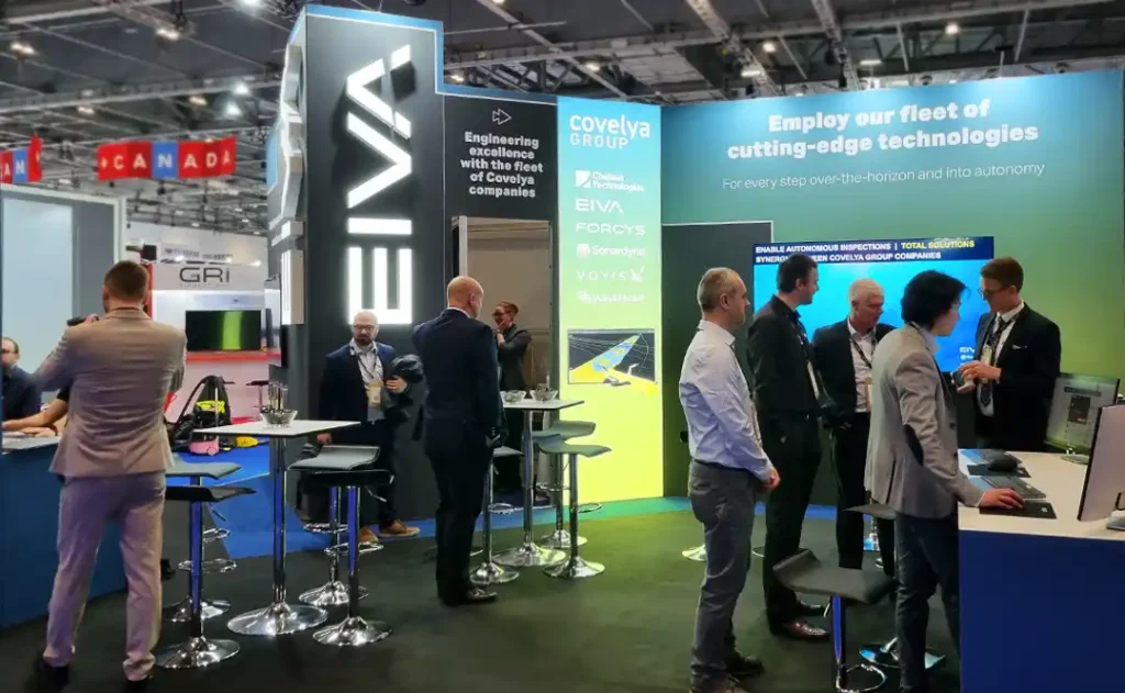 Oceanology International show London busy EIVA exhibition stand by Motive Exhibition
