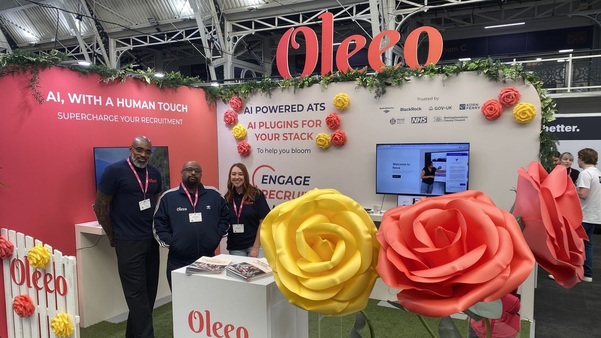 Oleeo IHR Live shell scheme exhibition stand Oleeo at IHR Live with shell scheme exhibition stand with reused flower